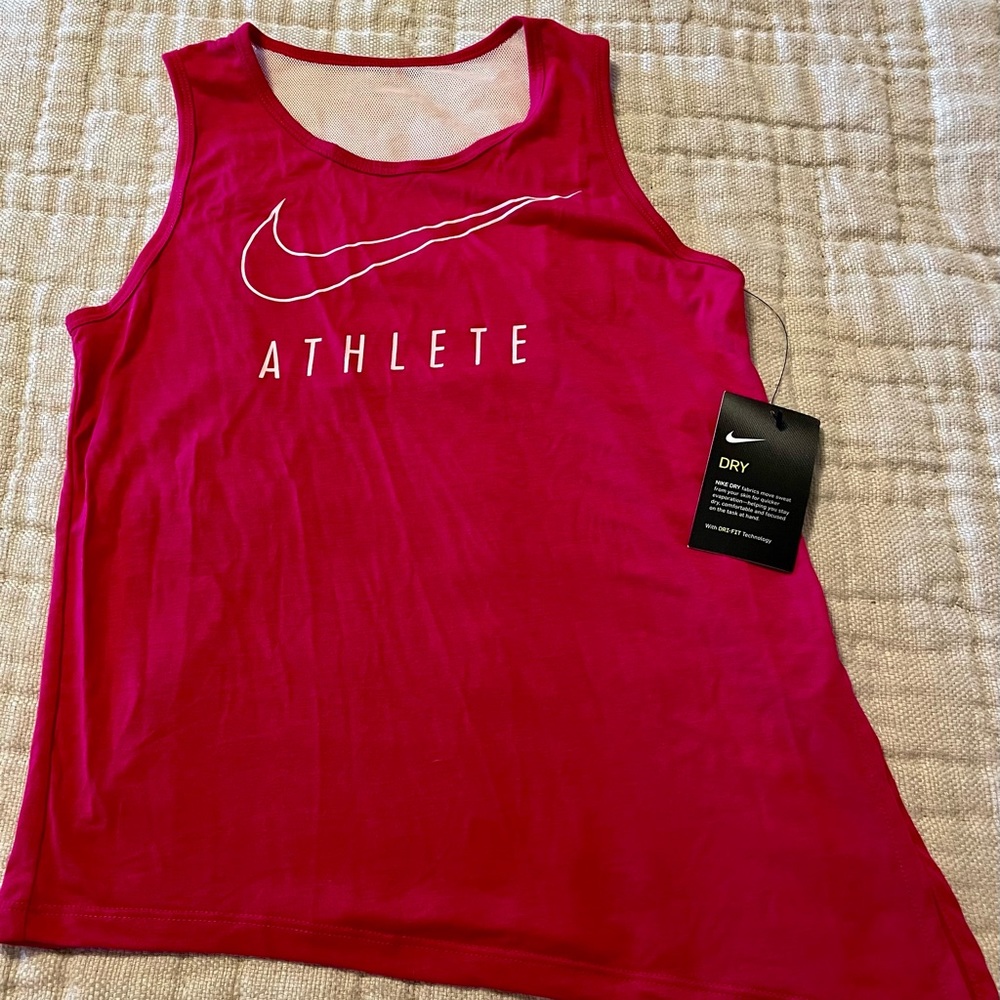 Girls Nike dry fit tank top. Size medium. New with tags.